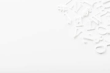 Closeup shot of hite letter board letters on a white background