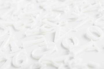 Fototapeta na wymiar Closeup shot of hite letter board letters on a white background