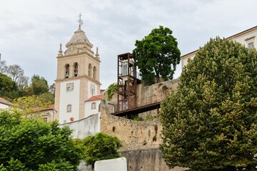 Bell Tower with a beautiful green surrounding in the historic center of Leiria in Portugal