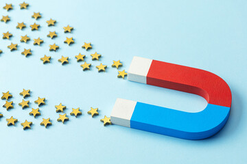 Magnet attracts stars. Concept Get positive feedback.