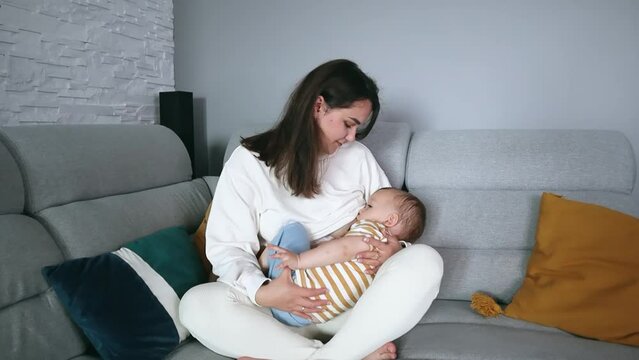 Mother breastfeeding her 1 year old baby. Breastfeeding and newborn care