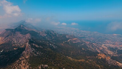 Fototapeta na wymiar Aerial coast views of Kyrenia, North Cyprus on sunny day with cloudy sky