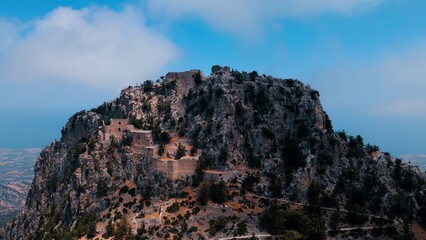 Fototapeta na wymiar Buffavento Castle in Kyrenia, North Cyprus on sunny day with cloudy sky
