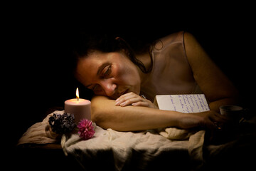 woman in romantic attitude reading a love letter II