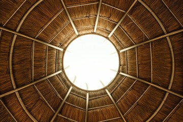 Low angle view of a ceiling with a round hole in the center