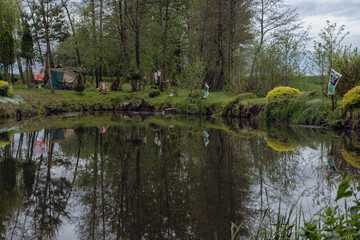 Fototapeta na wymiar Magic retreat, pond in the middle of the field - diy pond