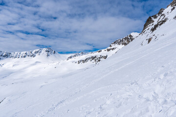Fototapeta na wymiar The peaks of the Tatra Mountains in the snow