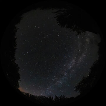 Starry night sky of the northern hemisphere and the Milky Way shot with a wide-angle fisheye circular lens. Fulldome photo format