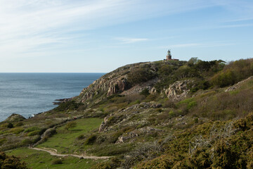 Fototapeta na wymiar lighthouse on a rocky coast