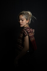 Naklejka premium Beautiful girl in Thailand costume,Asian woman wearing traditional Thailand culture at studio.Vintage style.