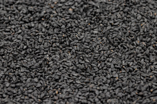 Pile of black cumin as background, spice or seasoning as background. Kalonji, nigella sativa, black cumin