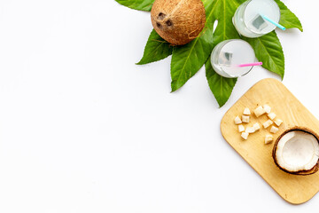 Two glasses of summer coconut cocktail. Beach time background