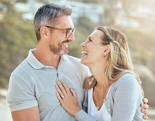 Happy, smile and love with couple at beach for laughing, travel and summer vacation. Happiness,...