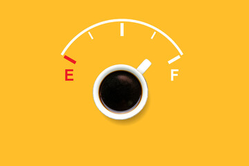 top view of black coffee with fuel gauge. concept of refueling energy for people with drinking...