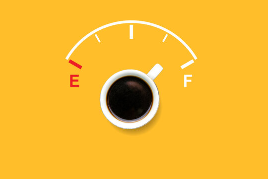 top view of black coffee with fuel gauge. concept of refueling energy for people with drinking coffee