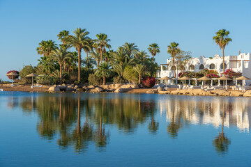 Fototapeta na wymiar Calm beach on the red sea of Sharm El Sheikh during sunrise, Egypt