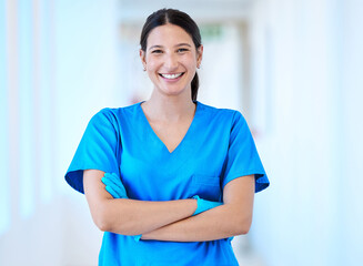 Woman, nurse and portrait with arms crossed and smile in a hospital and clinic. Employee,...