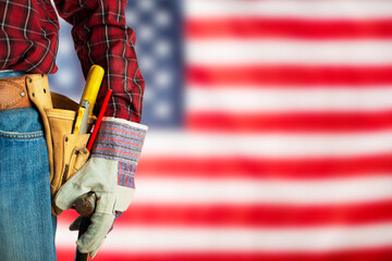 Worker in gloves and toolbelt on us flag background labor day mockup