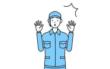 驚いて手を上げる帽子と作業着姿の女性