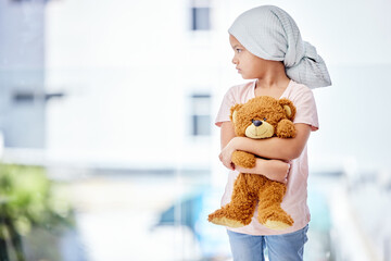 Healthcare, teddy bear and child cancer patient holding her toy for support or comfort. Medical, recovery and girl kid with leukemia standing after treatment or chemotherapy in a medicare hospital. - obrazy, fototapety, plakaty