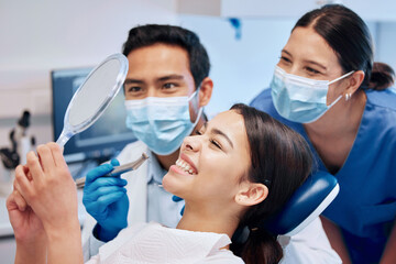 Dentist, mirror and woman with smile in consultation for teeth whitening, service and dental care. Healthcare, dentistry and female patient with orthodontist for oral hygiene, wellness and cleaning