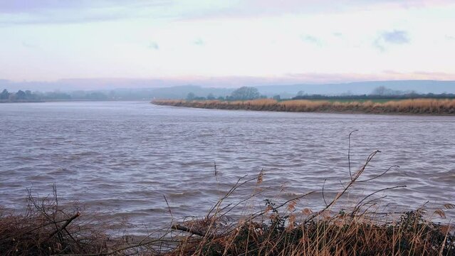 Severn River Flowing Upstream To Gloucester After A Four Star Tidal Bore