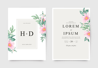 Minimalist wedding invitation with flowers and green leaves