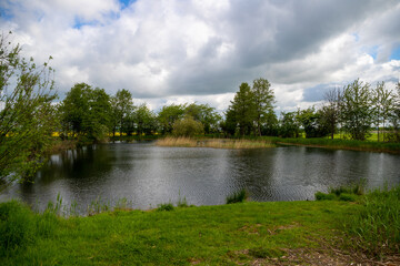 Small lake hidden in the forest