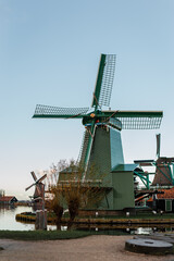 Naklejka premium Typical dutch windmill, at sunset