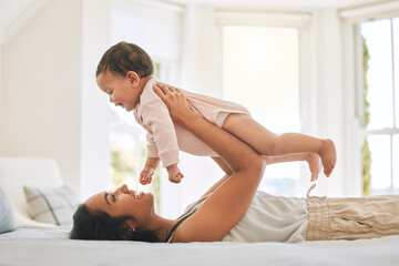 Mother, lifting baby and bedroom in family home for bonding, security or quality time. Happy woman...