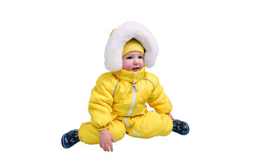Happy toddler baby in winter clothes snowsuit isolated on a white background. A child in a warm yellow jumpsuit with a hood. Kid aged one year five months