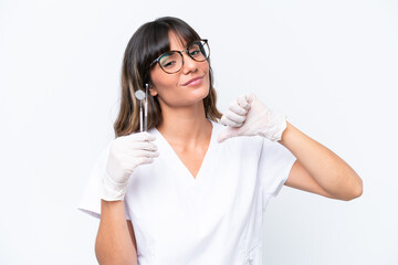 Dentist caucasian woman holding tools isolated on white background proud and self-satisfied