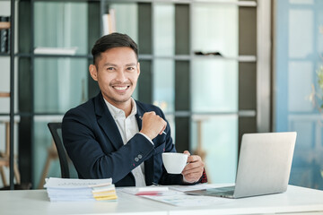 Fototapeta premium Asian business man working at table office, business finance technology, financial document and business accounting. 