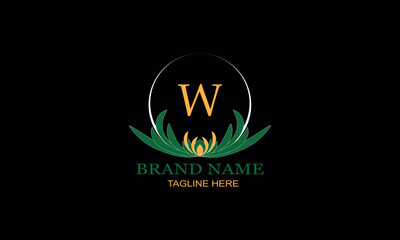 Floral logo design with elegant letter W. Monogram elements for women's beauty salon, massage, cosmetics or spa brand, business.