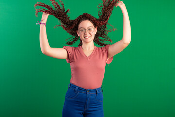 Teenager with red curly hair, wearing jeans, shirt, glasses and with various facial expressions of feelings