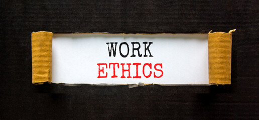 Work ethics symbol. Concept words Work ethics on beautiful white paper. Beautiful black paper cardboard background. Business and Work ethics concept. Copy space.