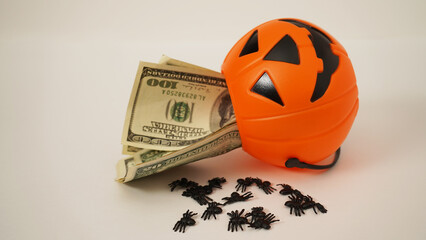  Dollars and pumpkin. Concept  halloween finance wealth. 