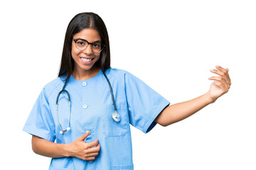 Young African american nurse woman over isolated background making guitar gesture