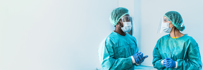 Multiracial surgeon team working inside the operating room - Healthcare and medical workers concept - 606545886