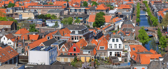 Fototapeta na wymiar Aerial view of typical colorful Dutch style homes in Delft city centrum, Netherlands.