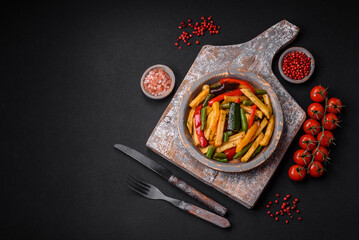 Delicious fried potatoes with bell peppers, asparagus beans, salt and spices
