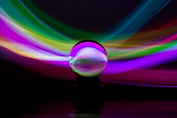 Glass Lens Ball and Coloured Light Trails