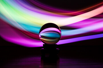 Glass Lens Ball and Coloured Light Trails © Gary Turner