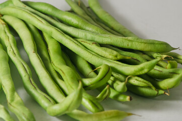Some green beans isolated on a white background
