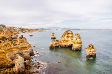 Algarve Beach with rocks and cliffs - Portuguese coastline