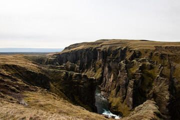 Fototapeta na wymiar Gorge in Iceland with a river crossing the gorge