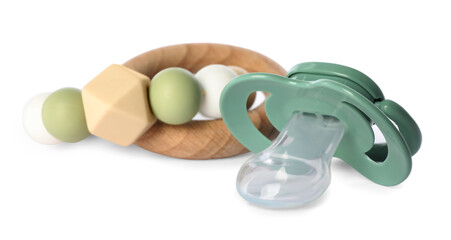 Toys and baby pacifier isolated on white