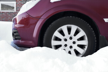 Fototapeta na wymiar Modern car with reliable tire on snow outdoors