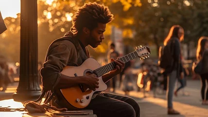 Foto op Plexiglas ギターを弾いて弾き語りするストリートミュージシャン・歌手の黒人男性（夕方の公園）  © buritora