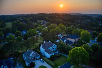 Aerial panoramic view of an upscale subdivision shot during golden hour